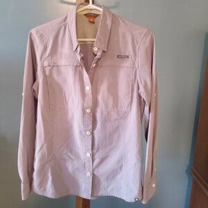 Ladies Eddie Bauer long sleeve button up blouse features hidden zippered pockets